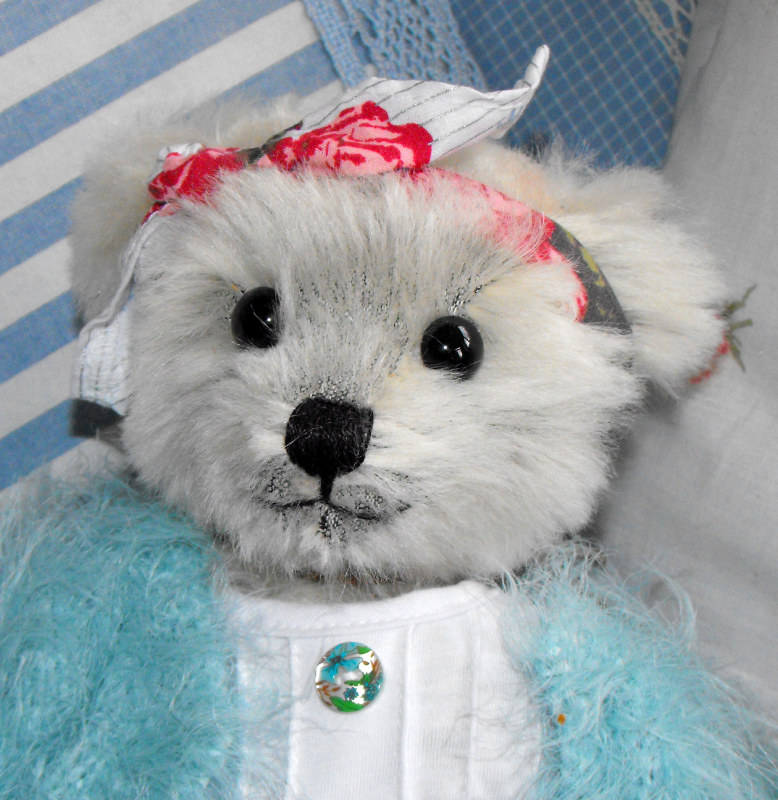 Grey bear with dress and cardigan